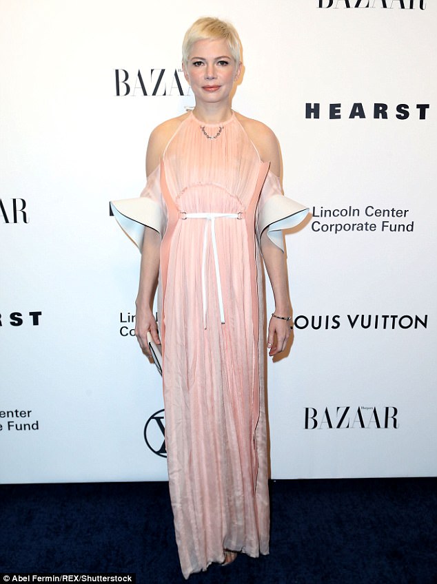 Angelic: Michelle Williams donned a pink silk Louis Vuitton SS/18 gown at a Manhattan event honoring Louis Vuitton designer Nicolas Ghesquière on Thursday night