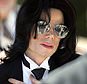 FILE - In this June 13, 2005 photo, Michael Jackson gestures as he leaves court during his trial on child molestation charges in Santa Maria, Calif. Wade Robson, who is now 35, testified at Jackson's criminal trial in 2005 that he had spent many nights in Jackson's room, but Jackson had never molested him. A judge has dismissed the lawsuit brought by Robson, who alleged Jackson molested him as a child. The summary judgment ruling Tuesday, Dec. 19, 2017, against Robson resolves one of the last remaining major claims against the late singer's holdings. (AP Photo/Mark J. Terrill, File)