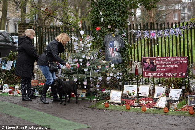 On the first anniversary  of George Michael's death, heartbroken fans flocked to his former home in Highgate, north London