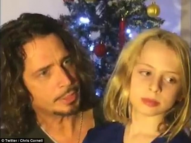 'Christmas will never be the same': Chris Cornell¿s widow Vicky shared a sweet throwback video of rocker with his son Christopher as his family prepare to spend first Xmas without singer after his tragic death