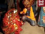 A male wedding guest was kidnapped from an Indian ceremony and forced to marry a woman at gunpoint as her family screamed: 'Shut up - we're only marrying you, not hanging you'. He is pictured after being dragged away to meet his new bride