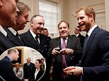 Prince Harry talks with Metropolitan Police officers as he and William host the winners of The Met Excellence Awards today