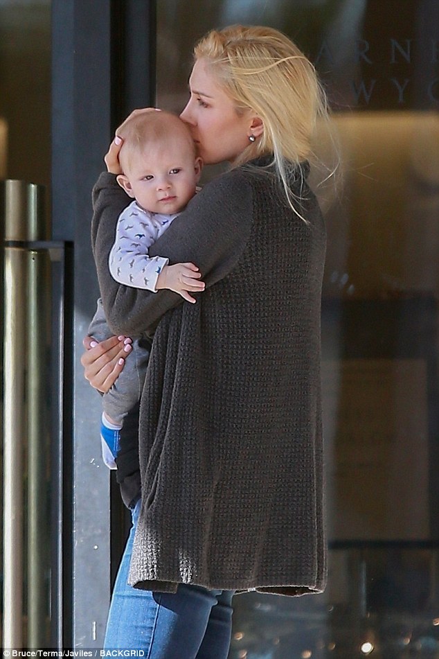 Mom duties: Heidi Montag, 31, took her turn with her son