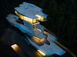Star ship cruiser home: This is the £97million spaceship like home, located inthe Moscow suburb of Bharvika, designed by famed architect Dame Zaha Hadid