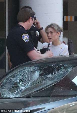 Jaime King was running errands on the trendy shopping strip of Bedford Drive when a disheveled man jumped on her car and smashed the windows