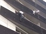 Malian immigrant Mamoudou Gassama (right), dubbed Spiderman for scaling four storeys to save a child dangling from a balcony in Paris, has met French President Emmanuel Macron (left) this morning