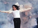 FILE - This Feb. 1, 1993 file photo shows Pop superstar Michael Jackson performing during the halftime show at the Super Bowl in Pasadena, Calif.  A musical about the King of Pop is moonwalking to Broadway. The Michael Jackson Estate and Columbia Live Stage are unveiling plans for a stage musical inspired by the life of Michael Jackson. They hope it will be ready for Broadway by 2020. (AP Photo/Rusty Kennedy, file)