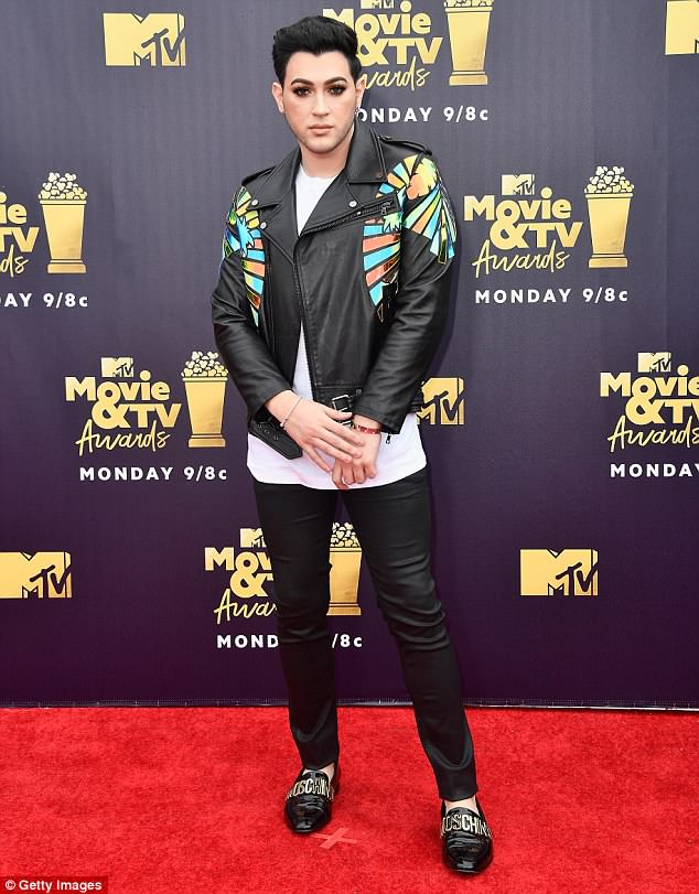 Makeup your mind! Manny MUA rocked Moschino shoes, a leather jacket, and of course perfect eyebrows
