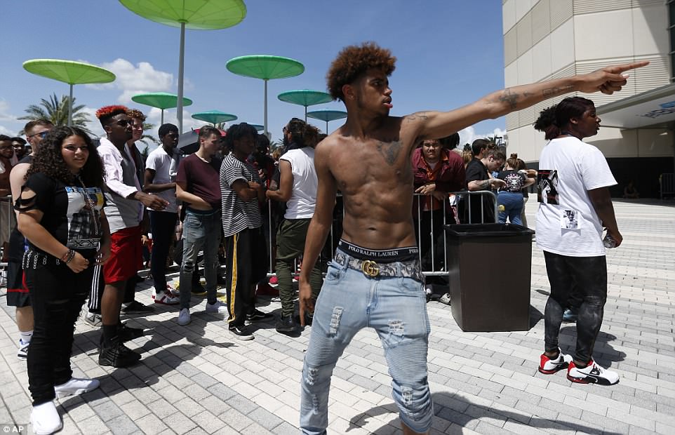 Fan Rafael Correa, 19, of Orlando, Florida, taunted the police as he danced before a memorial for the rapper, XXXTentacion 