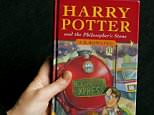 A rare first edition of Harry Potter And The Philosopher’s Stone bought by a schoolgirl 21 years ago has sold at auction for more than £56,000. Pictured, a first edition is pictured in 2007