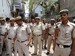 Five boys as young as nine gang-raped an eight-year-old girl in India after watching porn on a mobile phone, police say (file picture)
