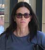 Low key: Courteney Cox went make up free while out for her morning workout in Beverly Hills on Saturday