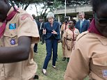 Theresa May (pictured today in Kenya)  dusted off her famous 'Maybot' moves again today as she joined in a dance with a group of Scouts while on the final leg of her African tour