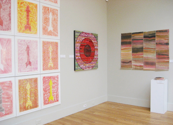 Immediately identifiable: Installation from the 2013 exhibition, Swept Away: Translucence, Transparence,Transcendence at the Cape Cod Museum of Art with, from left: David A. Clark arrow prints, Nancy Natale bricolage with tacked elements, Laura Moriarty geologic sculpture and prints. Photo by the author