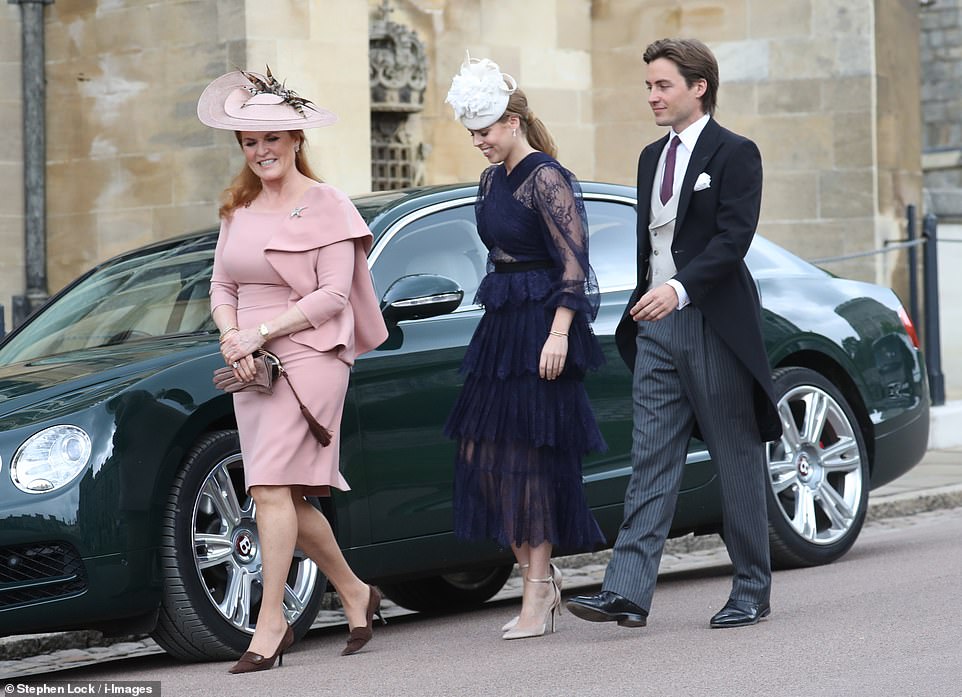 The Duchess of York arrives with her daughter Beatrice with her boyfriend Edoardo Marpelli Mozzi for the wedding