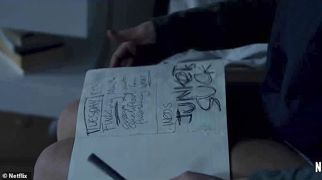 Not doing so well on the inside: The scene cuts to Miley's character scribbling in her journal, in which she writes in big bold writing: 'Junkets suck'
