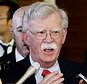FILE - In this Friday, May 24, 2019, file photo, U.S. National Security Adviser John Bolton is surrounded by reporters at the prime minister's official residence in Tokyo, Japan. North Korea on Monday, May 27, 2019, has called U.S. National Security Adviser Bolton a "war monger" and "defective human product" after he called the North's recent tests of short-range missile a violation of U.N. Security Council resolutions. (Yohei Kanasashi/Kyodo News via AP, File)