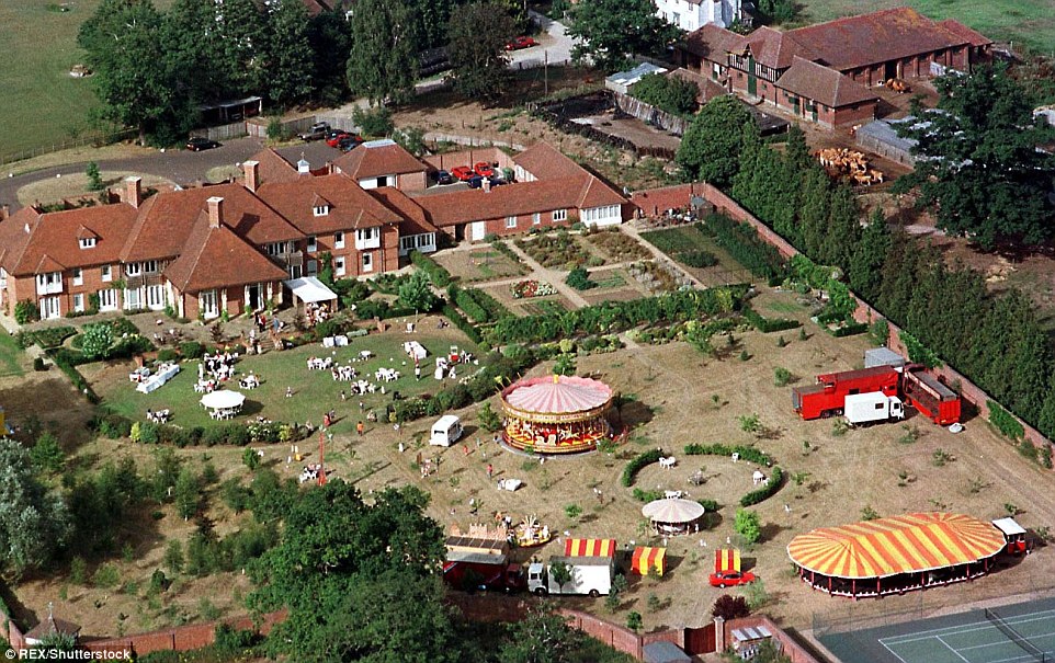 The grounds are so vast they could house a merry-go-round and dodgems, pictured her on Princess Beatrice's eighth birthday party in 1996