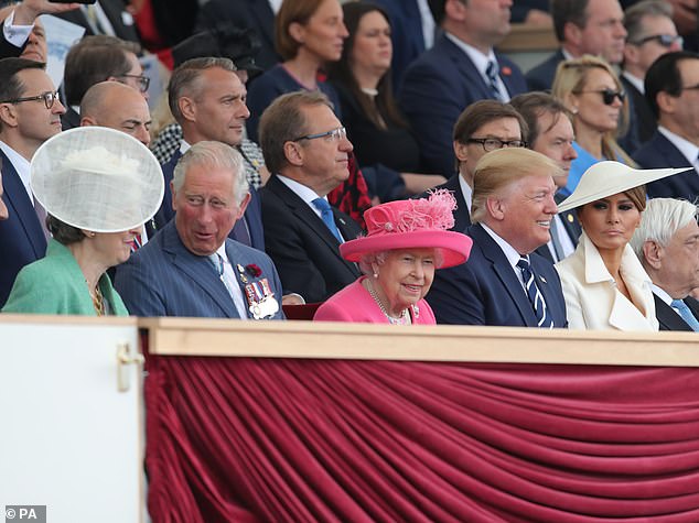 Prince Charles and Theresa May seem to share a joke as the Queen and Trump also laugh