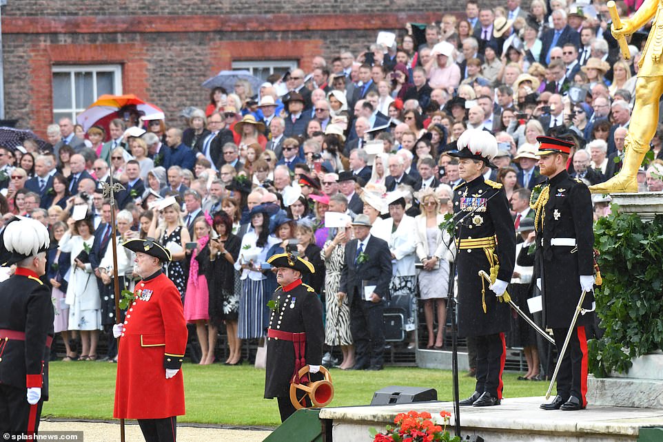 The Duke of Sussex reviews the Chelsea Pensioners at the annual Founder's Day Parade at the Royal Hospital Chelsea. A group of guests were invited to observe the spectacle, pictured