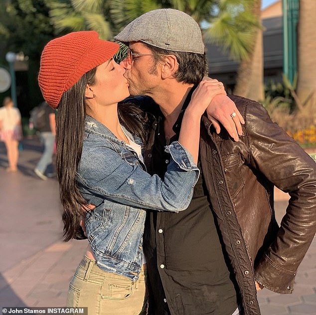 Love is in the air: John Stamos was every bit the doting husband on Tuesday when he took to Instagram to wish his wife Caitlin a Happy 33rd Birthday