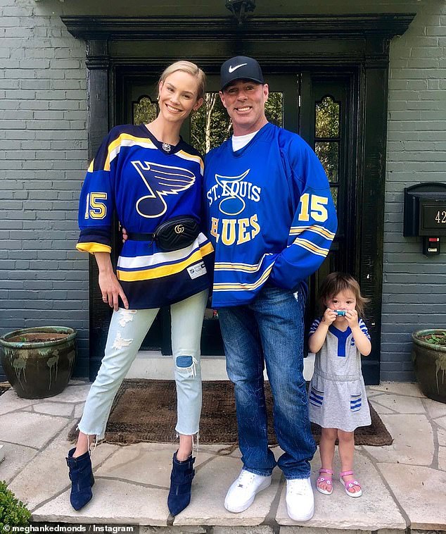 Smiling through struggle: The couple was well-outfitted to support the NHL champion St. Louis Blues in an Instagram post this week alongside their two-year-old daughter Aspen