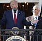 President Donald Trump, with first lady Melania Trump, and Vice President Mike Pence and his wife Karen, speaks from the Truman Balcony of the White House during the annual Congressional Picnic on the South Lawn, Friday June 21, 2019, in Washington. (AP Photo/Jacquelyn Martin)