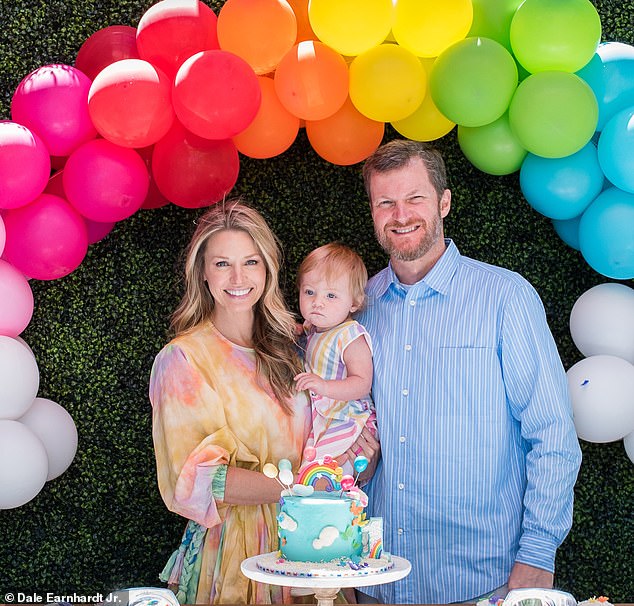 Amy Ernhardt (left) and husband Dale Earnhardt Jr. (right) celebrate the first birthday in April 2019 of their daughter Isla at their home in Mooresville, North Carolina