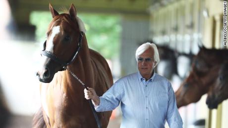 ELMONT, NY - JUNE 06:  Triple Crown and Belmont Stakes contender Justify is walked in his barn by trainer Bob Baffert after arriving  prior to the 150th running of the Belmont Stakes at Belmont Park on June 6, 2018 in Elmont, New York.  (Photo by Al Bello/Getty Images)