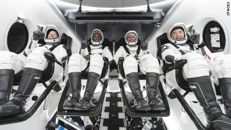 The SpaceX Crew-1 crew members (from left) NASA astronauts Shannon Walker, Victor Glover, Mike Hopkins, and JAXA (Japan Aerospace Exploration Agency) astronaut Soichi Noguchi.