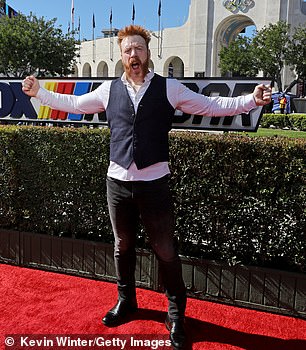Irishman: WWE fighter Sheamus also outstretched his arms ahead of the NASCAR race