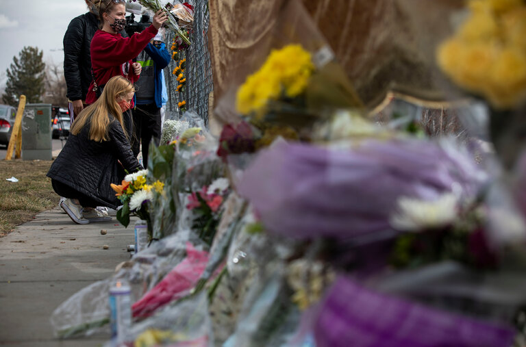 Mourners at a memorial in Boulder, Colo., for the victims of the mass shooting there.