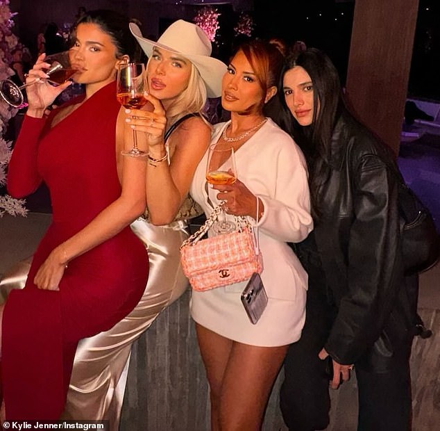 Kylie Jenner certainly is a popular lady. Last week she was surrounded by her close friends at the launch party for her debut fragrance Cosmic in Los Angeles , California . The 26-year-old was seen cozying up to the pretty ladies in photos shared to Instagram. Do you know who they are?