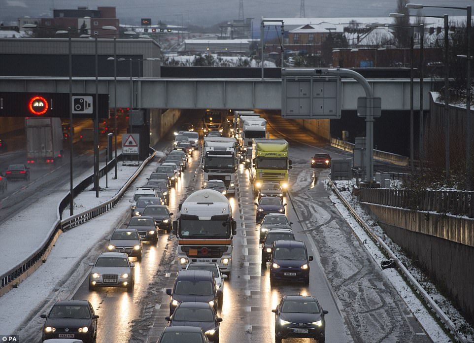 Heavy traffic on the M25 near junction 25, as snowfall across parts of the UK is causing widespread disruption and tailbacks on the motorway