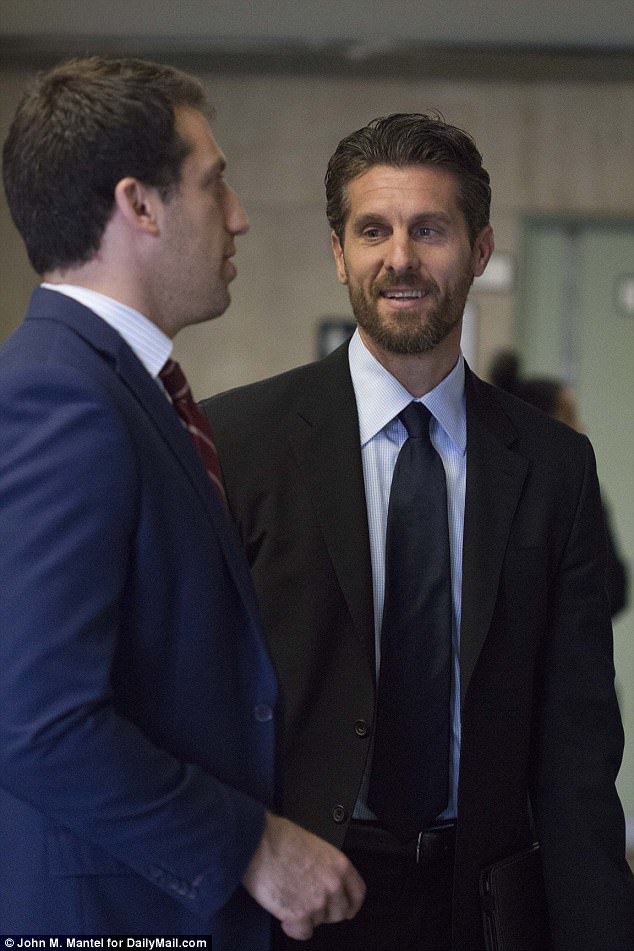 Glee: Jason Hoppy broke out in a smile while appearing in Manhattan Criminal Court on Wednesday (above)  after a judge pushed his stalking trial back to June