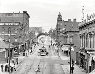 Front Street around 1909. The Marquette County Savings Bank Building is in the middleground at right
