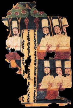 Manichean priests writing at their desks, with panel inscription in Sogdian. Manuscript from Khocho, Tarim Basin.
