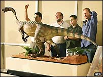 Researchers with model of Unaysaurus tolentinoi (AFP)