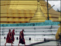 Monks in front of a pagoda near Rangoon, 08/10