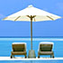 Chairs & umbrella at beach (© Datacraft/sozaijiten/age fotostock)