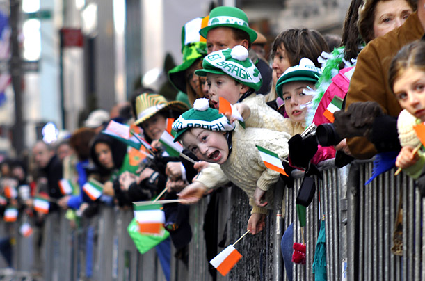People cheer New York's annual St. Patrick's Day Parade as it makes its way up Fifth Avenue.

