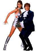 austin powers and a person in a silver dress dancing