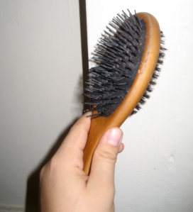It's not too clear in this pic, but see that ring of grey shit ringing the wooden part of the brush? That's a quart of an inch straight-up hair grease. From ONLY ONE BRUSHING.