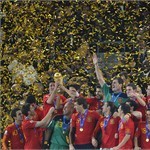 Spanish players celebrate with the trophy following the 2010 FIFA World Cup final.