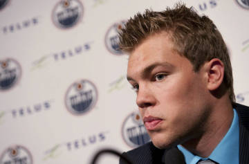 Edmonton Oilers' draft pick Taylor Hall attends a news conference in Edmonton on Monday, July 5, 2010 at Rexall Place. The Oilers have signed the No. 1 draft pick to a three-year, entry-level contract.