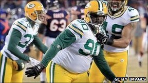 Green Bay Packers' BJ Raji celebrates a touchdown