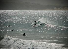 Surfers riding the waves in Morocco.