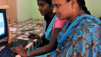 Indian women using a computer