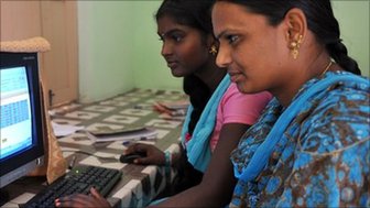 Indian women in front of a computer