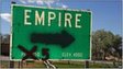 Empire, Nevada sign with population spray painted to five